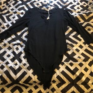 Black Crisscrossed long sleeve bodysuit